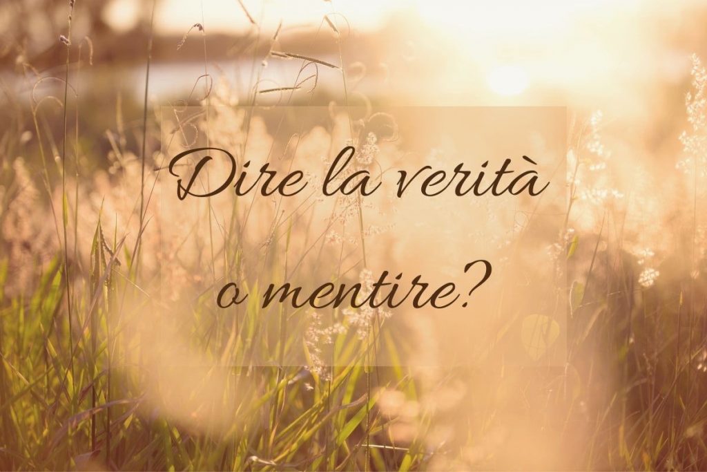 Campo al tramonto con la scritta "Dire la verità o mentire?" – riflessione visiva sul valore dell’onestà nelle relazioni umane